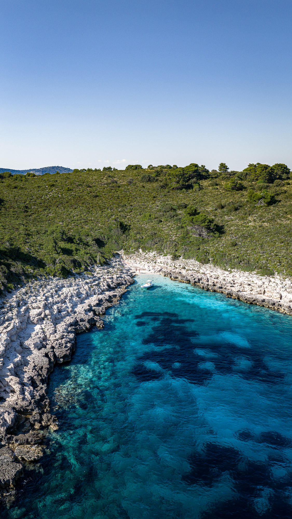 Pakleni Islands coastline aerial drone view - half day boat tour from Hvar